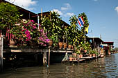 Scenery along the canal leading to Damnoen Saduak Floating Market. 